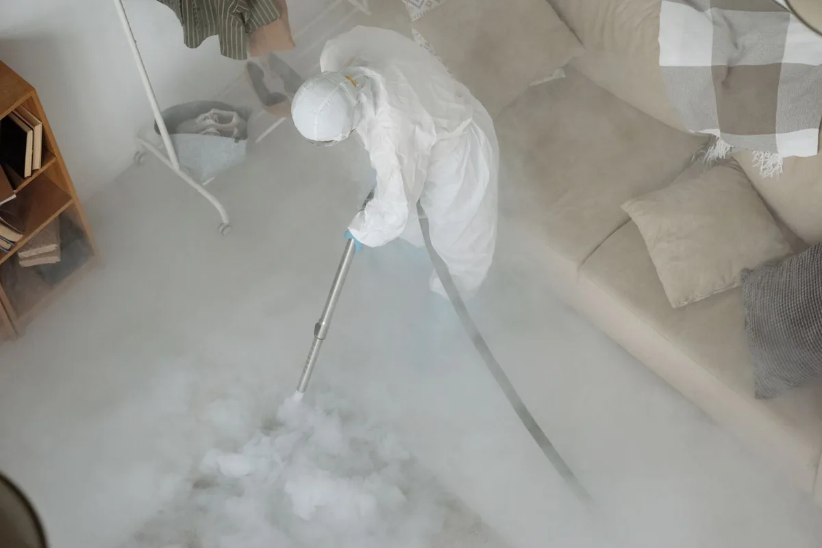 Biohazard cleanup technician in protective equipment, Moreno Valley, CA